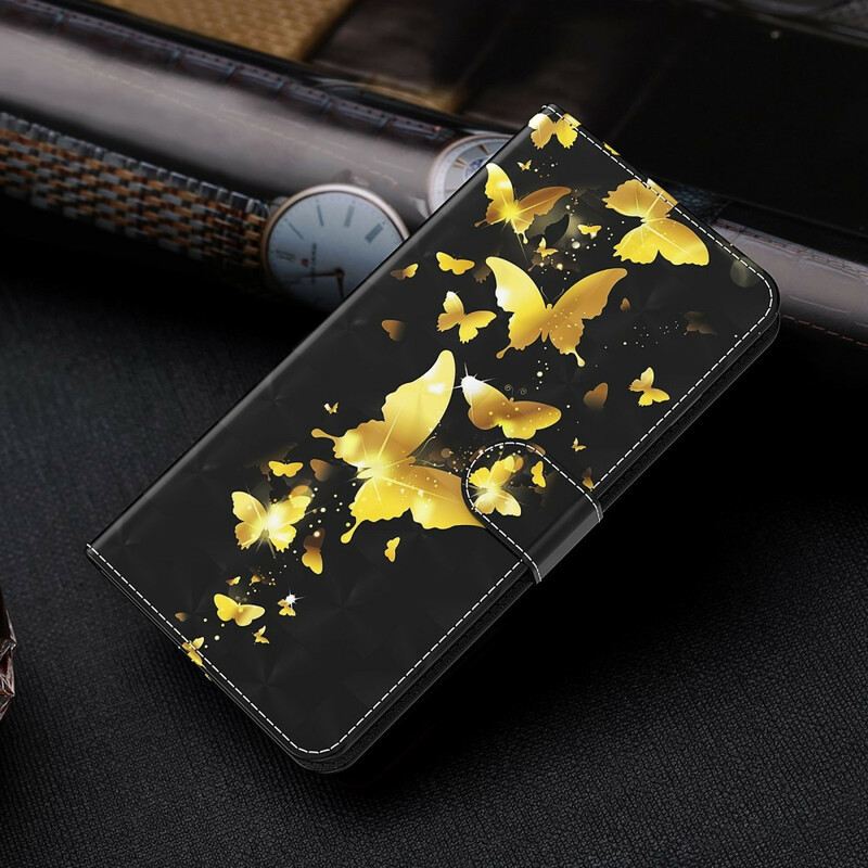 Fliptok / Bőrtok Samsung Galaxy M12 / A12 Sárga Pillangók