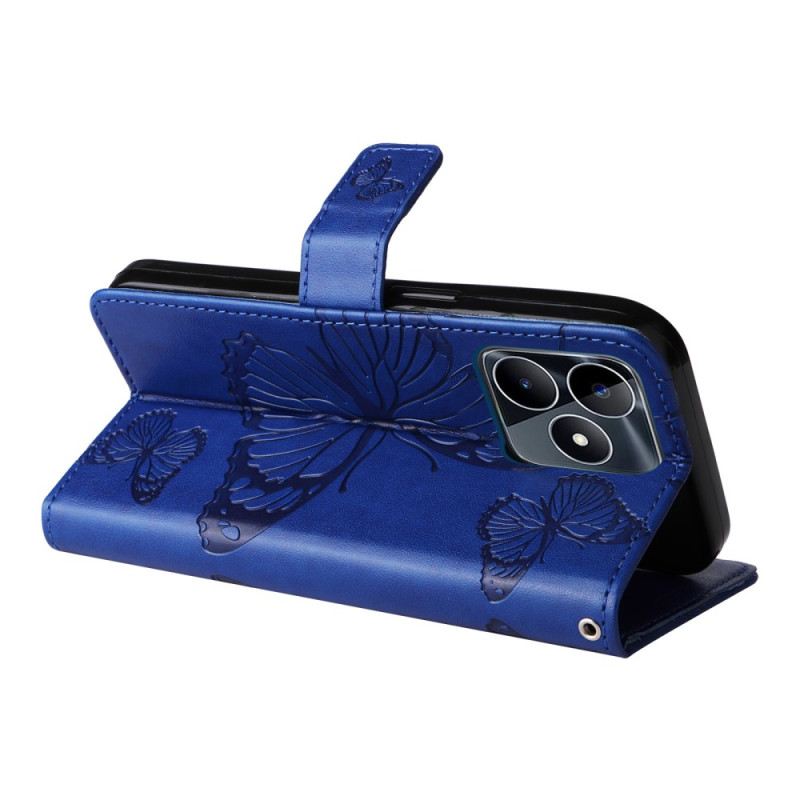 Bőrtok Realme C53 Óriás Pillangók Pánttal